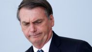 Brazil's President Jair Bolsonaro reacts during a ceremony to launch the program 'Doctors in Brazil' at the Planalto Palace in Brasilia, Brazil August 1, 2019. REUTERS/Adriano Machado
 
