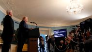 U.S. President Donald Trump speaks about the shootings in El Paso and Dayton as Vice President Mike Pence looks on in the Diplomatic Room of the White House in Washington, U.S., August 5, 2019. REUTERS/Leah Millis
