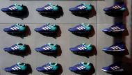 FILE PHOTO: Adidas soccer shoes are displayed at soccer shop KAMO in Tokyo, Japan May 17, 2018. REUTERS/Kim Kyung-Hoon