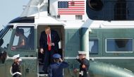 US President Donald Trump is seen in Marine One at Joint Base Andrews in Maryland, as he departs for a fundraising luncheon to benefit his reelection campaign and the Republican National Committee in Southampton, New York, U.S., August 9, 2019. (REUTERS/S