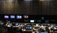 Traders are seen at the Stock Exchange in Buenos Aires on August 12, 2019.(AFP / RONALDO SCHEMIDT)