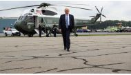 US President Donald Trump walks towards reporters from the Marine One helicopter to speak to them as he boards Air Force One for travel to Pennsylvania from Morristown Municipal Airport in Morristown, New Jersey, U.S. August 13, 2019. (REUTERS/Jonathan Er
