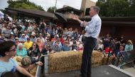 Democratic presidential candidate and former Governor of Colorado John Hickenlooper delivers a campaign speech at the Des Moines Register Political Soapbox at the Iowa State Fair on August 10, 2019 in Des Moines, Iowa. (Alex Wong/Getty Images/AFP)