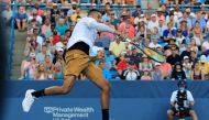 Nick Kyrgios (AUS) leaps to return a shot against Lorenzo Sonego (ITA) during the Western and Southern Open tennis tournament at Lindner Family Tennis Center. (Aaron Doster-USA TODAY Sports)