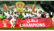 Al Sadd's players and officials celebrate after winning the 2019 Sheikh Jassim Cup after defeating Al Duhail 1-0 at the Jassim Bin Hamad Stadium on Saturday.  Ali Asad scored the winning goal in the 13th minute as Al Sadd, the most successful team in the 