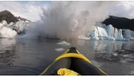The Spencer Glacier collapses, forming a big wave moments before it crashes into a kayaker, in Alaska, U.S., August 10, 2019, in this still image taken from a video obtained from social media. @steeringsouth/via REUTERS