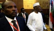 Chadian President Idriss Deby is escorted as he arrives for the signing of the Sudan's power sharing deal, that paves the way for a transitional government, and eventual elections, following the overthrow of long-time leader Omar al-Bashir, in Khartoum, S