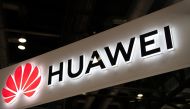 FILE PHOTO: Huawei logo is seen during the Consumer Electronics Expo in Beijing.  AFP / FRED DUFOUR
