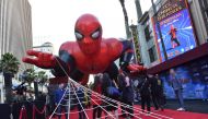 (FILES) In this file photo taken on June 26, 2019, a giant inflatable Spider-Man is displayed on the red carpet for the