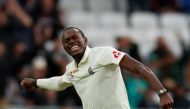  England's Jofra Archer celebrates taking the wicket of Australia's Pat Cummins (Reuters/Andrew Boyers)