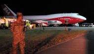 Handout picture released by Bolivia's Presidency showing a Supertanker, an aerial firefighting airtanker, after it landed at Viruviru airport in Santa Cruz de la Sierra, on August 23, 2019, to help fight the fires raging in eastern Bolivia. (AFP PHOTO / B