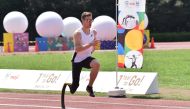 Germany's Paralympic athlete Markus Rehm warms up in a long jump demonstration in Tokyo on August 25, 2019, as part of a countdown event marking one year before the start of the Tokyo 2020 Paralympic Games. AFP / Kazuhiro NOGI