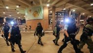 Police and riot police march to clear off protesters and residents in Wong Tai Sin in Hong Kong, China, August 24, 2019. REUTERS/Ann Wang
