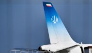 The air-plane which carried Iran's Foreign Minister Mohammad Javad Zarif stands on the tarmac at the airport of the French seaside resort of Biarritz, south-west France, during the G7 summit in Biarritz, on August 25, 2019, on the second day of the annual