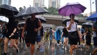 Protesters march together in Tseun Wan in Hong Kong on August 25, 2019, in the latest opposition to a planned extradition law that has since morphed into a wider call for democratic rights in the semi-autonomous city. AFP / Lillian Suwanrumpha 