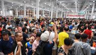 People visit the first Costco outlet in China, on the stores opening day in Shanghai on August 27, 2019. AFP / HECTOR RETAMAL