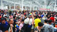 People visit the first Costco outlet in China, on the stores opening day in Shanghai on August 27, 2019.  AFP / Hector Retamal