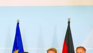 Qatar Chamber Chairman Sheikh Khalifa bin Jassim Al Thani (left), Germany’s Member of Ministries Council and Parliamentary State Secretary at the Federal Ministry for Economic Affairs and Energy, Thomas Bareiss (centre), and an official posing for a pictu