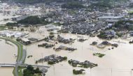 An aerial view shows submerged houses and facilities at a flooded area in Takeo, Saga prefecture, southern Japan August 28, 2019, in this photo taken by Kyodo. Kyodo/via REUTERS 