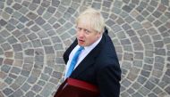(FILES) In this file photo taken on August 26, 2019 British Prime Minister Boris Johnson walks towards his meeting in Biarritz, south-west France, on the third day of the annual G7 Summit. AFP / LUDOVIC MARIN