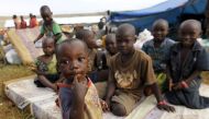 FILE PHOTO: Burundian refugee children pose for a photograph at the Lake Tanganyika stadium in Kigoma western Tanzania, May 19, 2015. REUTERS/Thomas Mukoya