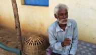 Rescued bonded labourer Srikrushna Rajhansiya recalls his days in bondage outside his home in Sargul village in Odisha. Reuters