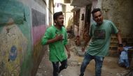 Rappers Mohammad Omar (R) and Wasim Masih perform in Lyari, one of Pakistan’s most dangerous neighbourhoods, in Karachi, on May 19, 2019. AFP / Rizwan Tabassum