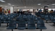 Empty counters and seats are seen at the gates of Charlotte Amalie Harbor Seaplane Base as most flights have been cancelled as Tropical Storm Dorian approaches in St Thomas, U.S. Virgin Islands August 28, 2019. Reuters/Gabriella N Baez
 