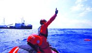 Crew members of the German NGO Sea-Eye migrant rescue ship 'Alan Kurdi' take part in a training exercise while on their way to the search and rescue zone off the North African coast, in the western Mediterranean Sea, August 29, 2019. Reuters/Darrin Zammit