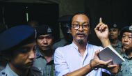 Myanmar human rights activist and film director Min Htin Ko Ko Gyi speaks to journalists after a court verdict in Yangon on August 29, 2019. AFP / Sai Aung Main
