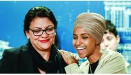 US Representatives Rashida Tlaib and Ilhan Omar react as they discuss travel restrictions to Palestine during a news conference in St Paul, Minnesota.