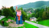 People work on a wooden statue, designed by local Slovenian artist Tomaz Schlegl, made to resemble  Donald Trump in the village of Sela pri Kamniku, about 20 miles northeast of Ljubljana in Slovenia, the home country of Trump's wife on August 28, 2019. AF