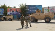 Afghan security forces patrol an area during a Taliban attack in the downtown of Kunduz city, Afghanistan August 31, 2019. REUTERS