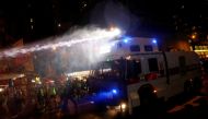 A police water cannon sprays water during a protest in Hong Kong, China August 31, 2019. REUTERS/Kai Pfaffenbach