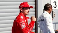 Ferrari's Charles Leclerc celebrates after qualifying in pole position REUTERS/Francois Lenoir