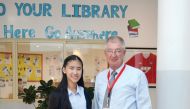 The Principal of Doha British School, Terry McGuire, with student Natalie Magness. 