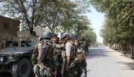 Afghan security forces gather at a street in Kunduz on August 31, 2019. AFP / Bashir KHAN SAFI
