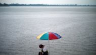 A man fishes on the Phayao lake in Phayao province, Thailand, March 26, 2019. Reuters/Panu Wongcha-um