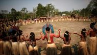 Indigenous people from the Shanenawa tribe dance during a festival to celebrate nature and ask for an end to the burning of the Amazon, in the indigenous village of Morada Nova near Feijo, Acre State, Brazil, September 1, 2019. REUTERS/Ueslei Marcelino