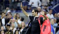 Roger Federer of Switzerland waves to the fans as he walks off the court after his loss to Grigor Dimitrov of Bulgaria during quarterfinal Men's Singles match on day nine of the 2019 US Open at the USTA Billie Jean King National Tennis Center on September