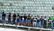 Medical students hold hands and participate in a human chain during a protest against the police brutality at the Faculty of Medicine in The University of Hong Kong, China, September 5, 2019. Reuters/Anushree Fadnavis
 