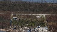 TOPSHOT - An aerial view of floods and damages from Hurricane Dorian on Freeport, Grand Bahama on September 5, 2019. / AFP / Adam DelGiudice 