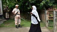 A woman arrives to check her name on the final list of the National Register of Citizens (NRC) in Morigaon district of Assam on August 31, 2019.  AFP / David Talukdar 