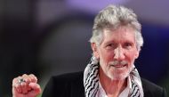 English rock musician, singer-songwriter, and composer Roger Waters arrives for the screening of the film 
