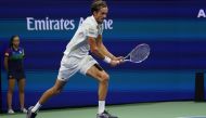 Daniil Medvedev of Russia runs for the ball during his match against Grigor Dimitrov of Bulgaria during their Singles Men's Semi-finals match at the 2019 US Open at the USTA Billie Jean King National Tennis Center in New York on September 6, 2019. / AFP /