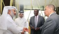 Sheikh Thani bin Ali bin Saud Al Thani (second left) and other officials on the sidelines  of the event.