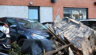 A roof landed on vehicles during Hurricane Dorian is seen in Halifax, Nova Scotia, Canada September 8, 2019. REUTERS/John Morris