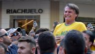 FILE PHOTO: Brazilian presidential candidate Jair Bolsonaro reacts after being stabbed during a rally in Juiz de Fora, Minas Gerais state, Brazil, September 6, 2018. REUTERS/Raysa Campos Leite