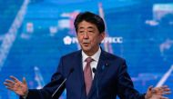 File photo of Japan's Prime Minister Shinzo Abe gives a speech as he takes part in a plenary session of Eastern Economic Forum at far-eastern Russian port of Vladivostok on September 5, 2019. / AFP / TASS Host Photo Agency / Vladimir SMIRNOV 