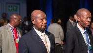 File photo of Uganda's President Yoweri Museveni (C) arrives to attend the World Economic Forum (WEF) Africa meeting at the Cape Town International Convention Centre, on September 5, 2019, in Cape Town. / AFP / RODGER BOSCH 